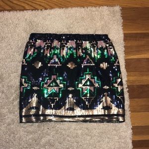 Sequined patterned black skirt.